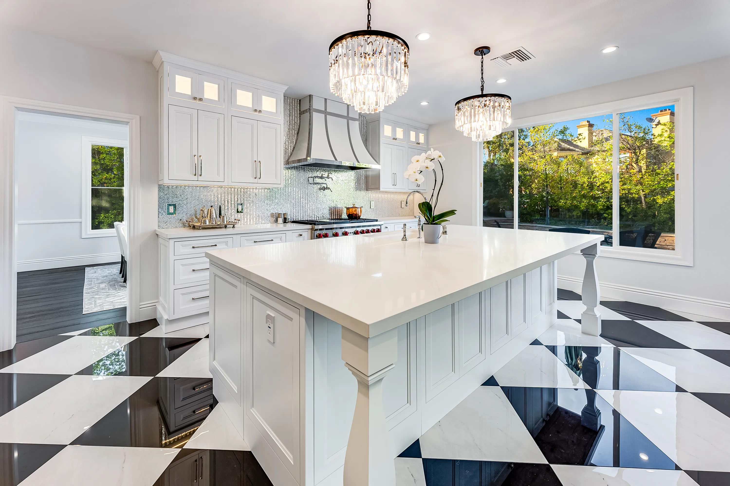 Kitchen island facing the window wall over the sink