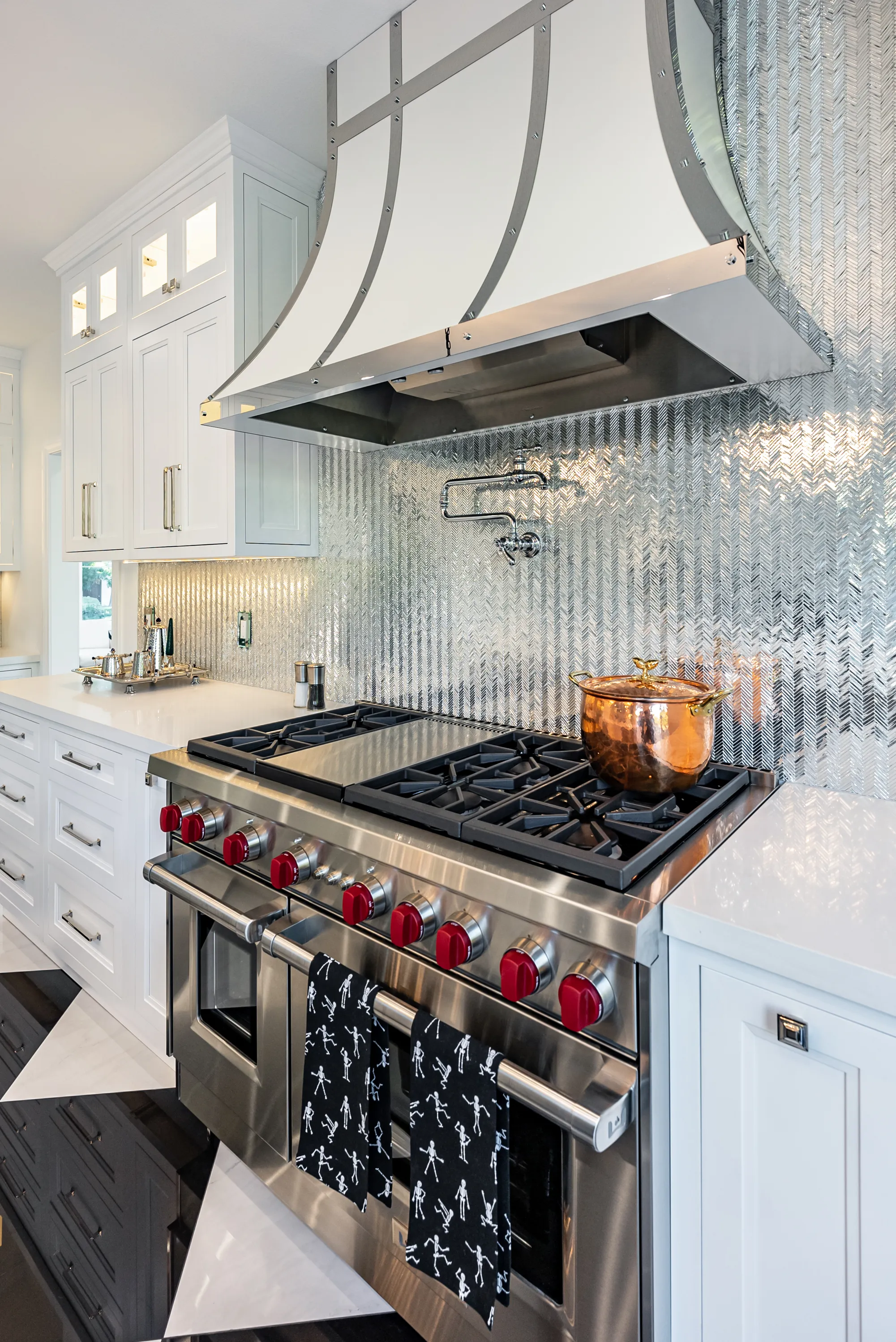 48-inch range with red knobs and stainless trim