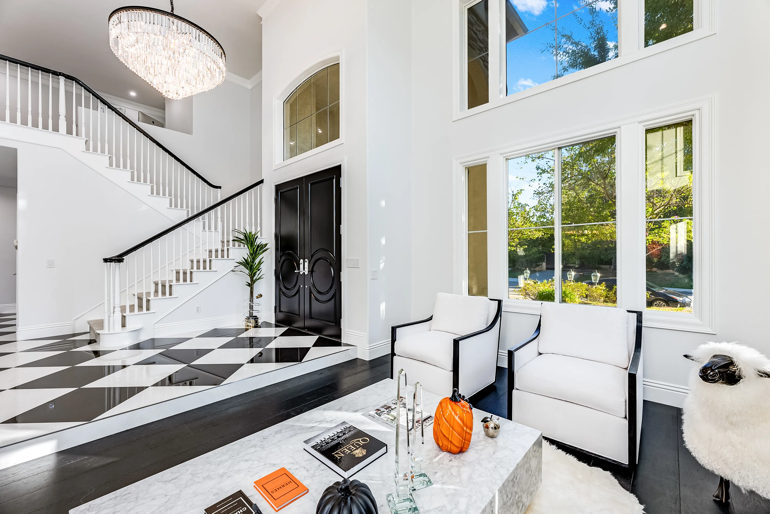 Staircase landing with arched window