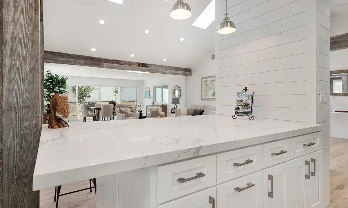 View from kitchen island across the open living room