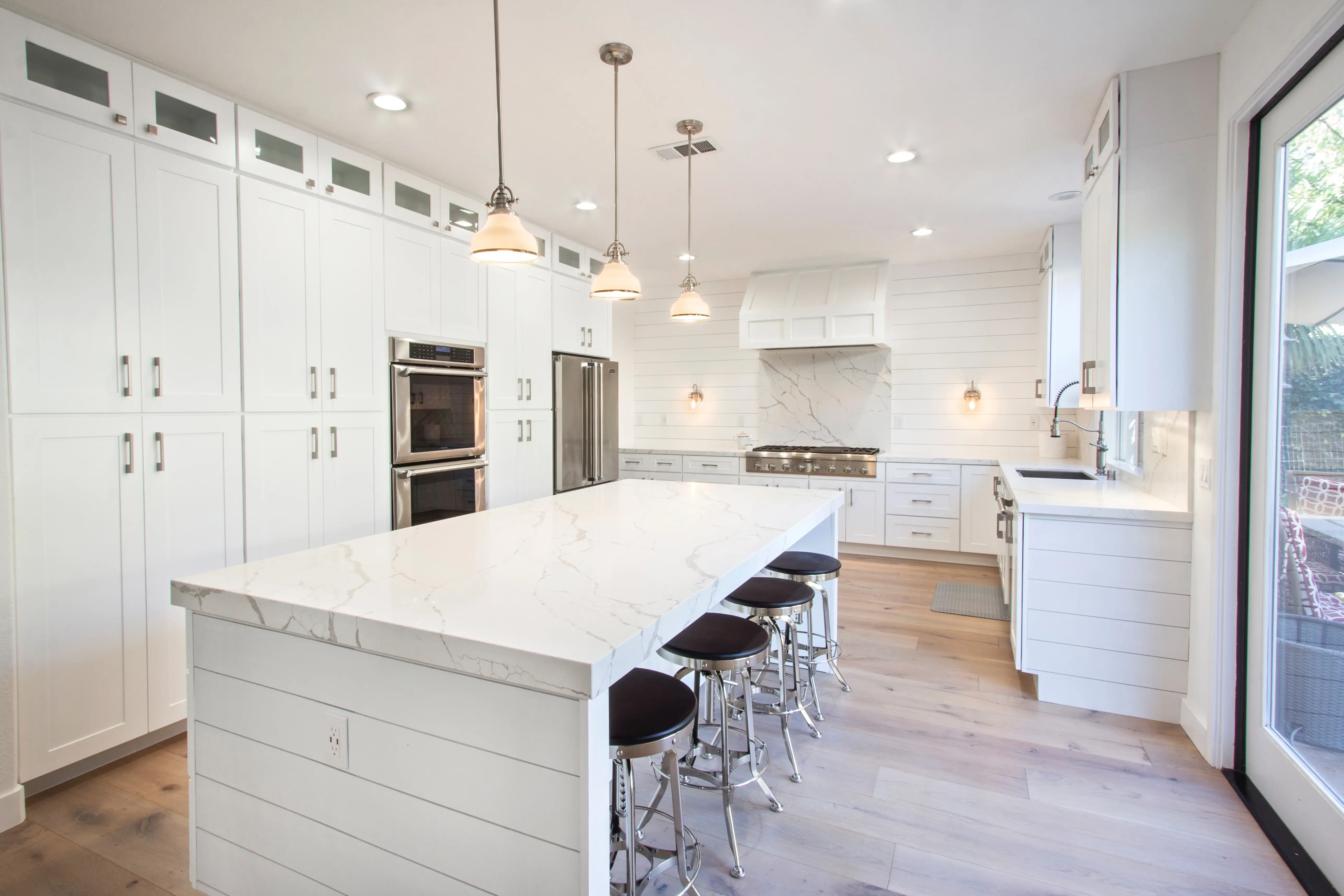 Kitchen island with sliding doors to the backyard