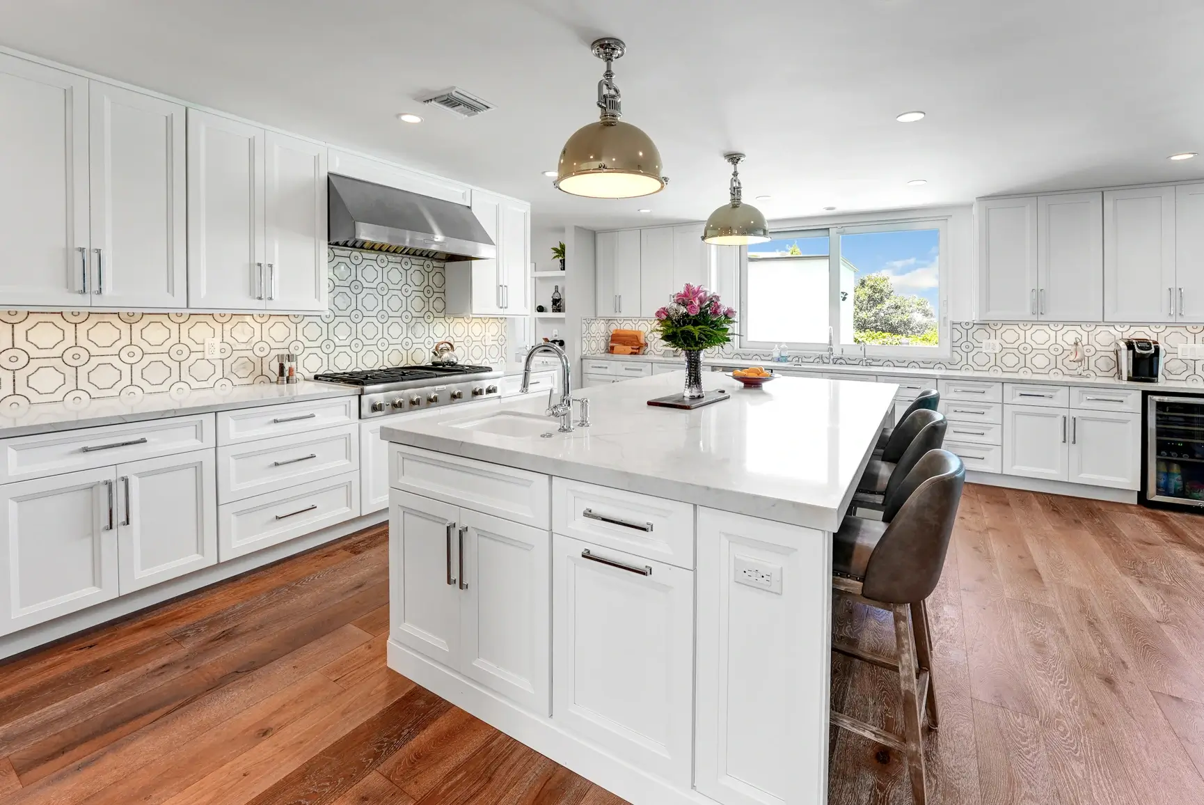 Kitchen with island and window over the sink
